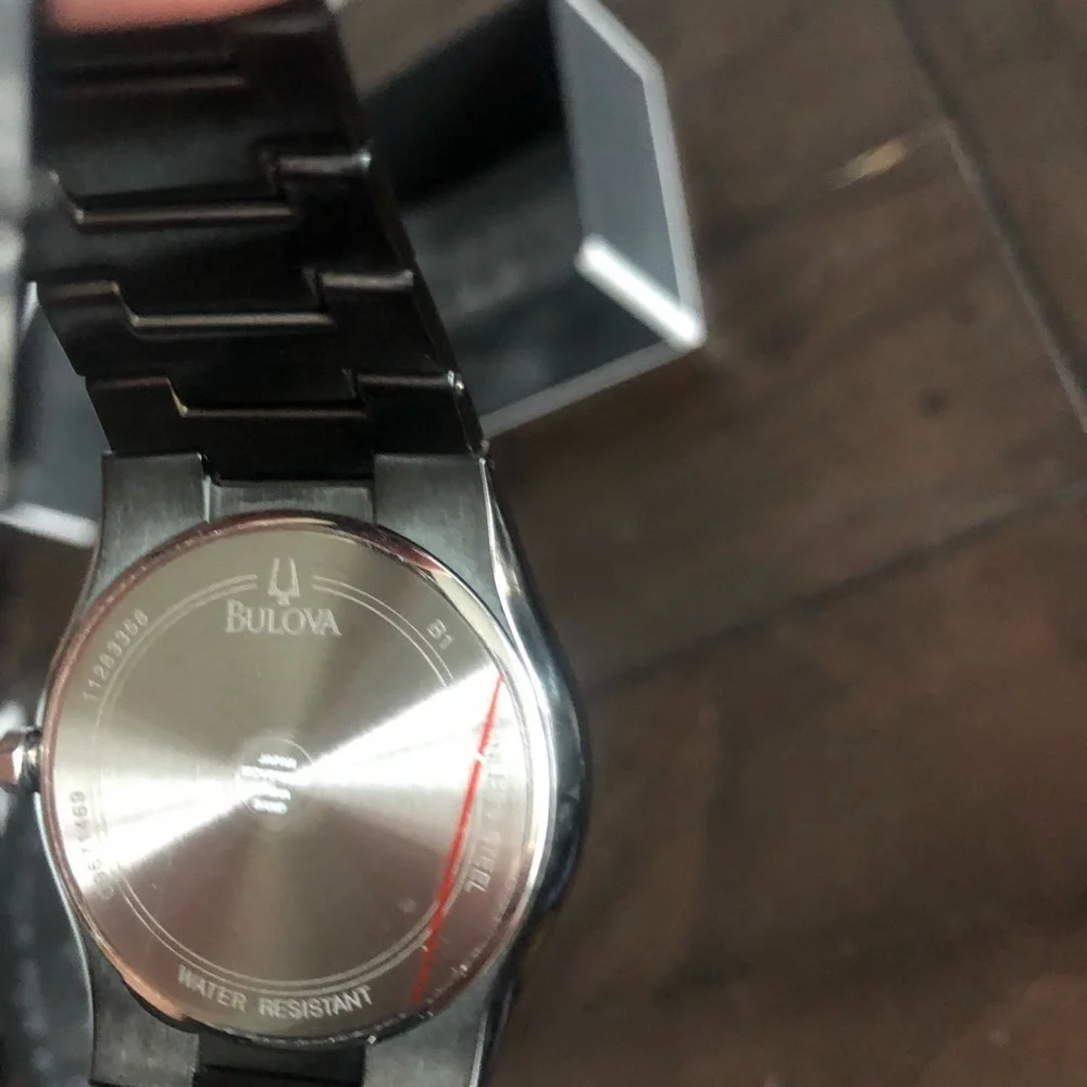 Bulova black watch.
